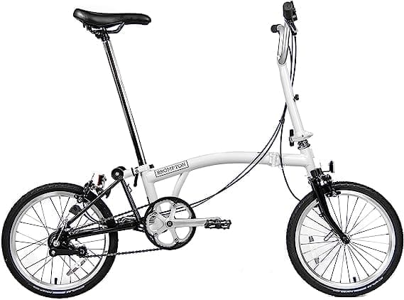 A white folding bike with 16-inch wheels and a steel frame, unfolded.